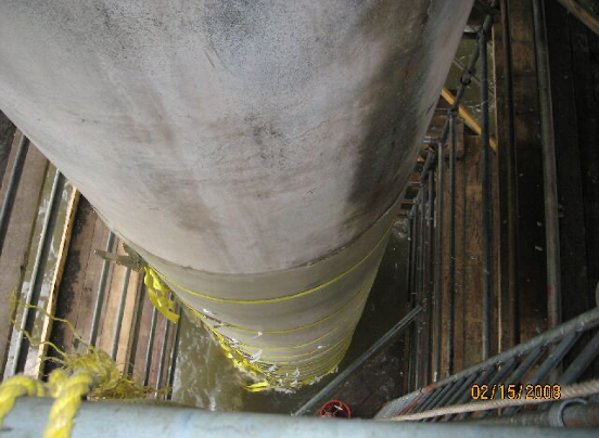 Piling with some of fiberglass in place for encapsulation